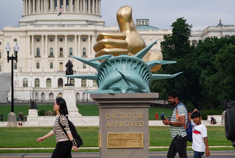 A statue titled "Dictator Approved" is displayed on the National Mall on June 17, 2025. (Kevin Carter/Getty Images)