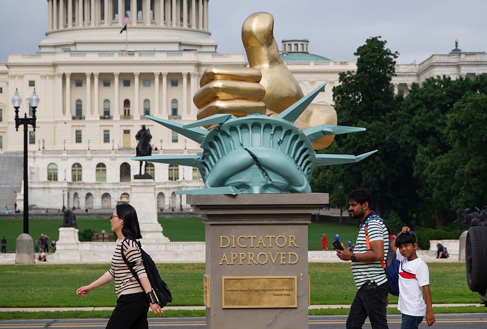 A statue titled "Dictator Approved" is displayed on the National Mall on June 17, 2025. (Kevin Carter/Getty Images)