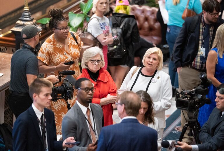 COLUMBIA, SOUTH CAROLINA - MAY 23: Republican state Sen. Katrina Shealy (L) with Sen. Penry Gustafson, stares down Republican Sen. Richard Cash as he speaks with journalists after the Senate passed a ban on abortion after six weeks of pregnancy on May 23, 2023 in Columbia, South Carolina. A bi-partisan group of five women, including Shealy and Gustafson, led a filibuster that failed to block the legislation. (Photo by Sean Rayford/Getty Images)