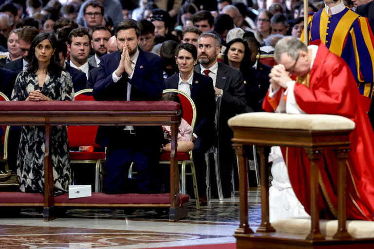 Vice President JD Vance and his wife Usha (front row, left) have been raising their family with interfaith values - her Hindu background and his recent Catholic faith. They appear at many events together, even a public mass, but now, Vance expresses his desire for Usha to convert to Christianity. But did he mean Catholic Christianity or Christian evangelicalism? Hindus and Catholics are left questioning his comment. (Alessandra Benedetti - Corbis / Corbis via Getty Images)