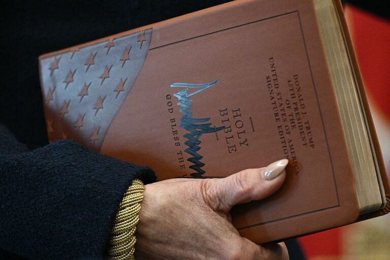 Donald Trump is still pandering to his base by relying on the Bible in awkward ways, including misquoting scripture, signing actual Bibles and selling his own version. (BRENDAN SMIALOWSKI / AFP via Getty Images)