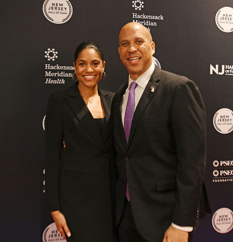 Sen. Cory Booker (R) and Alexis Lewis wed in 2 private ceremonies this week in Newark and D.C., surrounded by close family. (Bobby Bank / Getty Images)