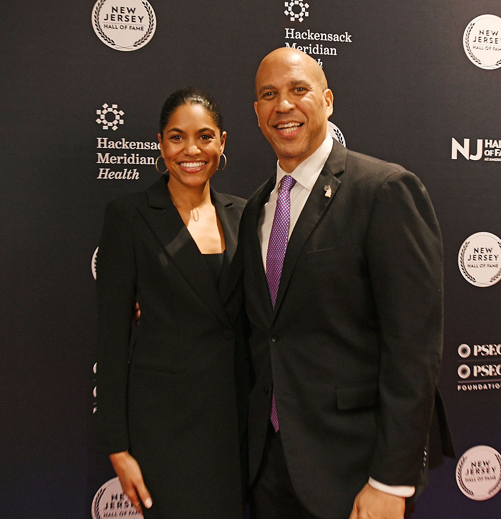 Sen. Cory Booker (R) and Alexis Lewis wed in 2 private ceremonies this week in Newark and D.C., surrounded by close family. (Bobby Bank / Getty Images)