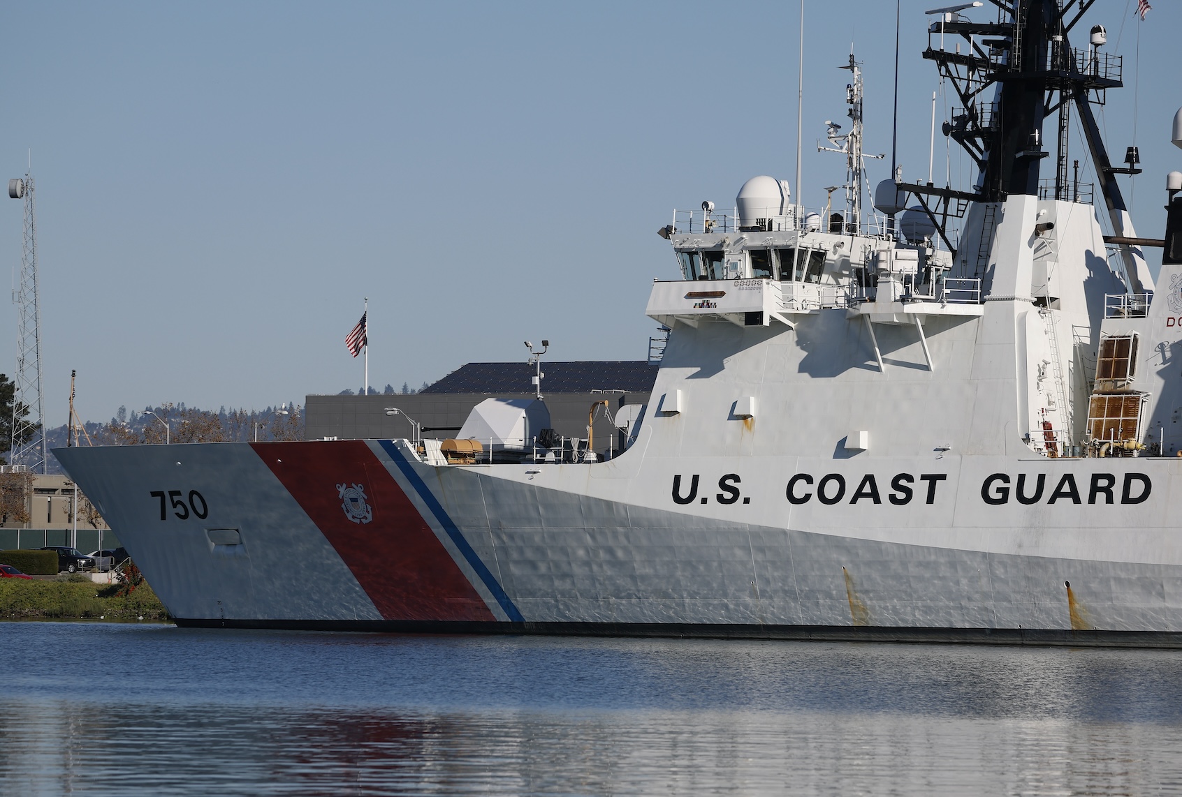 ALAMEDA, CALIFORNIA - NOVEMBER 21: A U.S. Coast Guard cutter sits docked at Coast Guard Island Alameda on November 21, 2025 in Alameda, California. In response to mounting public and congressional backlash, the U.S. Coast Guard reversed a proposed policy that would have called swastikas and nooses “potentially divisive,” reinstating a strict prohibition on those symbols as “divisive or hate symbols” under its updated guidance. (Photo by Justin Sullivan/Getty Images)