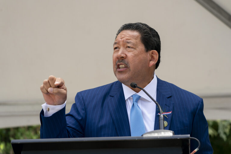 Seattle Mayor Bruce Harrell speaks during a naturalization ceremony for new U.S. citizens at Seattle Center on July 4, 2025. (Photo by David Ryder/Getty Images)