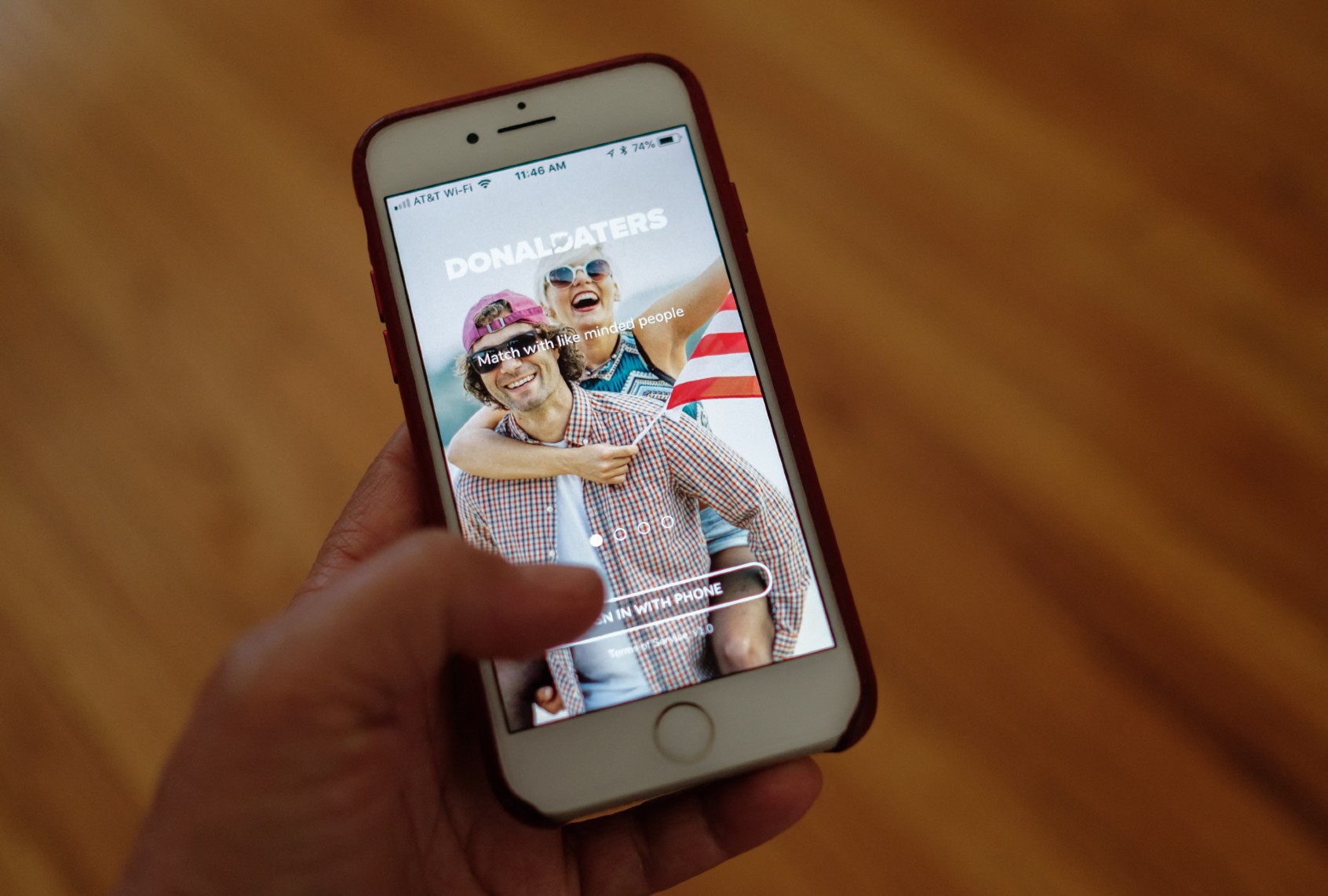 A person looks at DonaldDaters, a dating app for Trump supporters (CHRIS DELMAS/AFP via Getty Images)