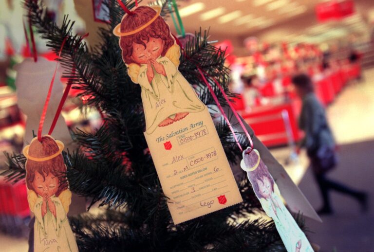 A Salvation Army Christmas Tree at Target in Santa Ana, where the public is encouraged to select an angel with a child's name and gift preference (Al Schaben/Los Angeles Times via Getty Images)