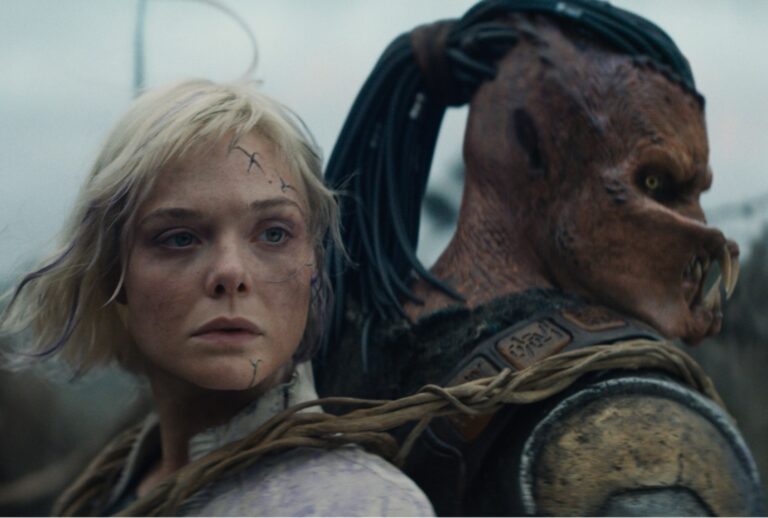 Elle Fanning as Thia and Dimitrius Schuster-Koloamatangi as Dek in "Predator: Badlands" (20th Century Studios)