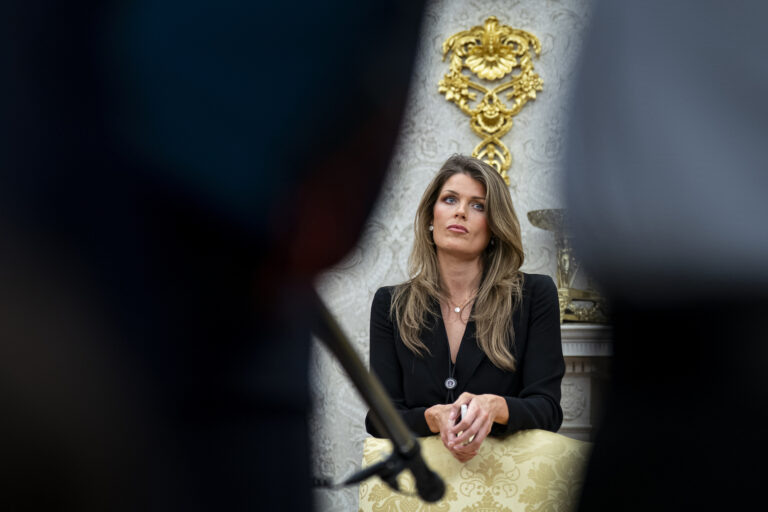Lindsey Halligan, attorney for U.S. President Donald Trump, looks on during an executive order signing in the Oval Office of the White House, on March 31, 2025 in Washington, DC. (Photo by Al Drago/Getty Images)
