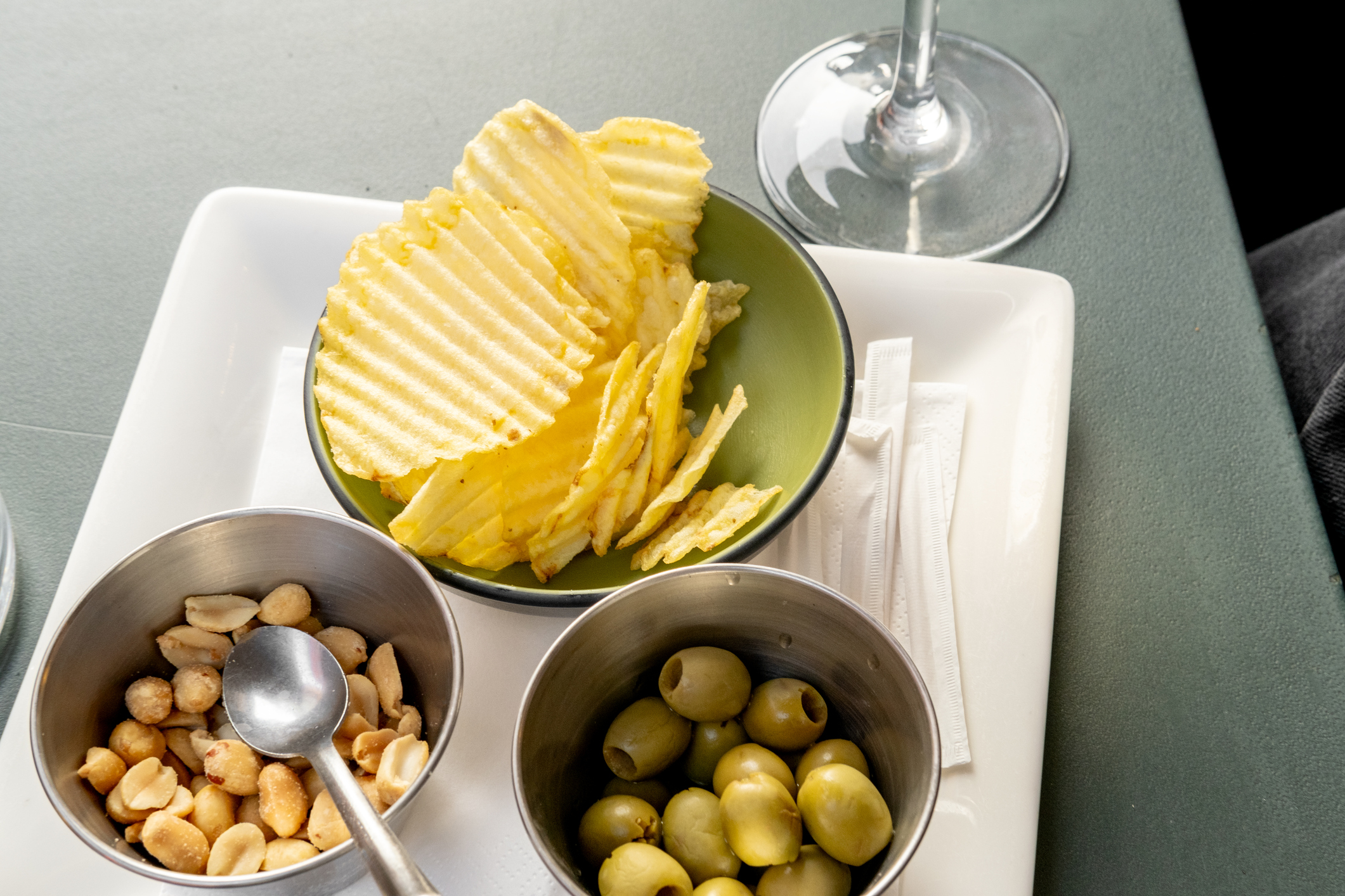 Chips, olives and salted peanuts (Elena Noviello/Getty Images)
