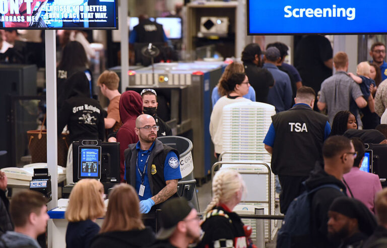 TSA lines are already every travelers' nightmare, but now they are sharing your data with ICE to catch more "illegal" travelers. (Paul Hennesy / Anadolu / Getty Images)