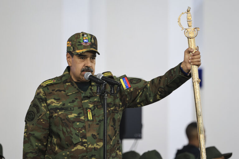 President of Venezuela Nicolás Maduro delivers a speech while holding the Venezuelan independence hero Simon Bolivar's 'Sword of Peru' during a military ceremony on November 25, 2025, in Caracas, Venezuela. The United States recently designated the "Cartel De Los Soles" (Cartel of The Suns) as a foreign terrorist organization, a group allegedly led by the president of Venezuela, Nicolas Maduro, and which, it is presumed, includes high-ranking members of the Venezuelan government. ((Photo by Jesus Vargas/Getty Images))