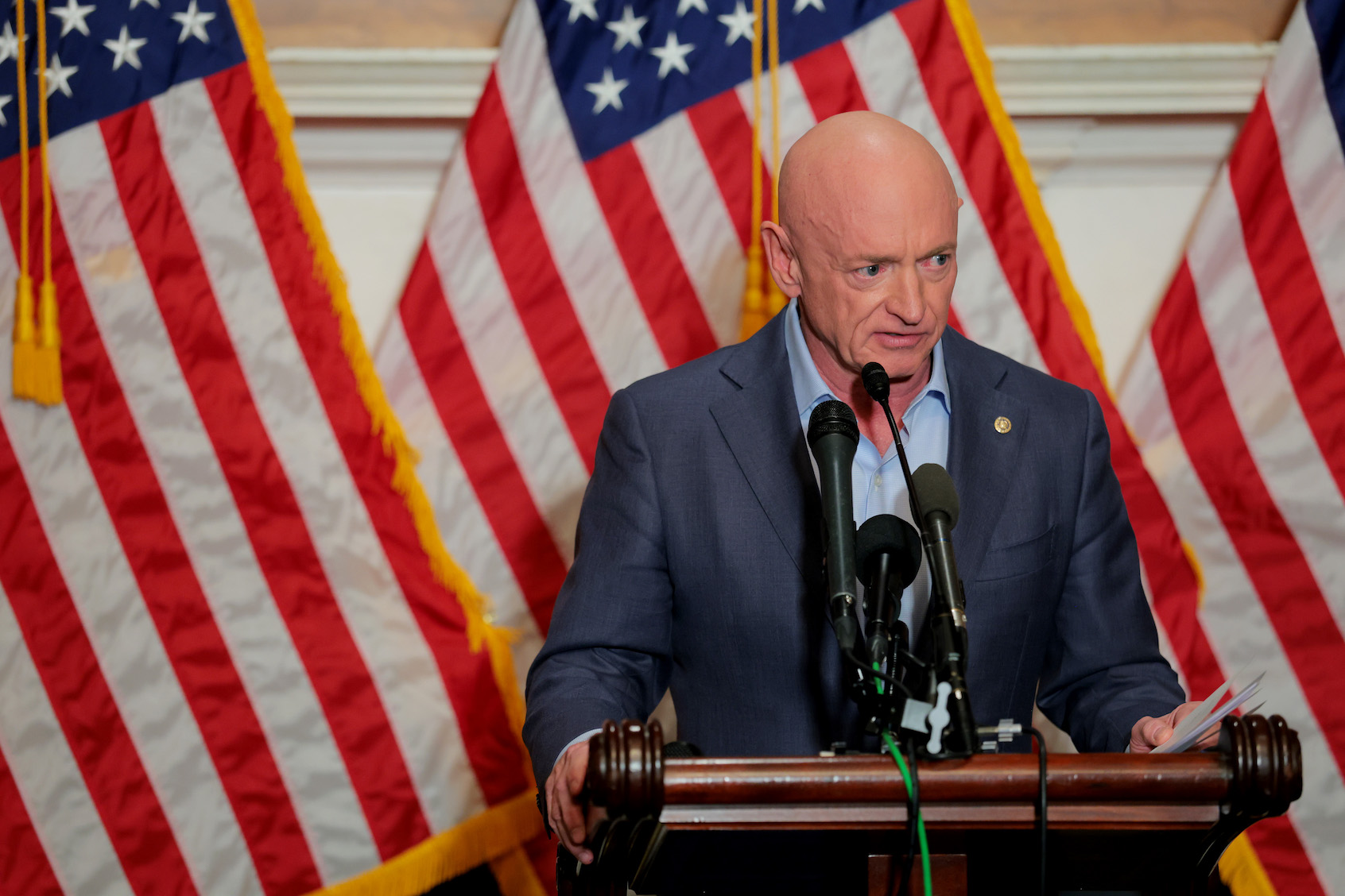 U.S. Sen. Mark Kelly (D-AZ) speaks at a news conference in the U.S. Capitol on December 1, 2025, in Washington, DC. Kelly held the event to address what he described as intimidating actions by U.S. President Donald Trump and Secretary of War Pete Hegseth, following a video in which Kelly and several lawmakers urged U.S. troops to refuse âillegal orders.â (Photo by Anna Moneymaker/Getty Images)