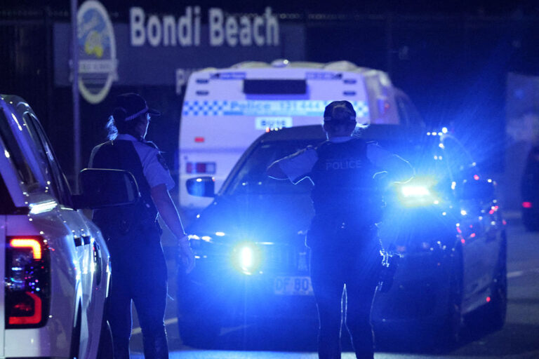 Officials are sorting through the crime scene that saw Australia's deadliest mass shooting in decades. The suspects targeted a Hanukkah celebration in what's being called a terrorist antisemitic attack. (DAVID GRAY / Getty Images)