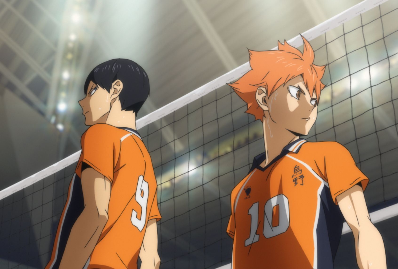 Animated image of two volleyball players in orange and navy uniforms standing in front of a net in a bright auditorium. The dark-haired one with No. 9 on his jersey is giving a side-eye, while the shorter orange spiky-haired player with No. 10 on his jersey is glaring to the side