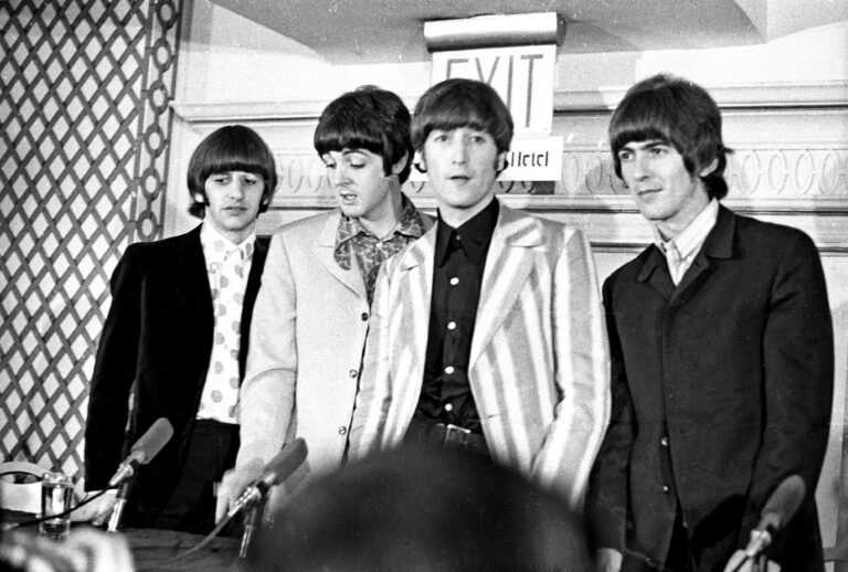 The Beatles answer questions regarding their Shea Stadium concert at a press conference on August 23, 1965 in New York City. (Michael Ochs Archives/Getty Images)