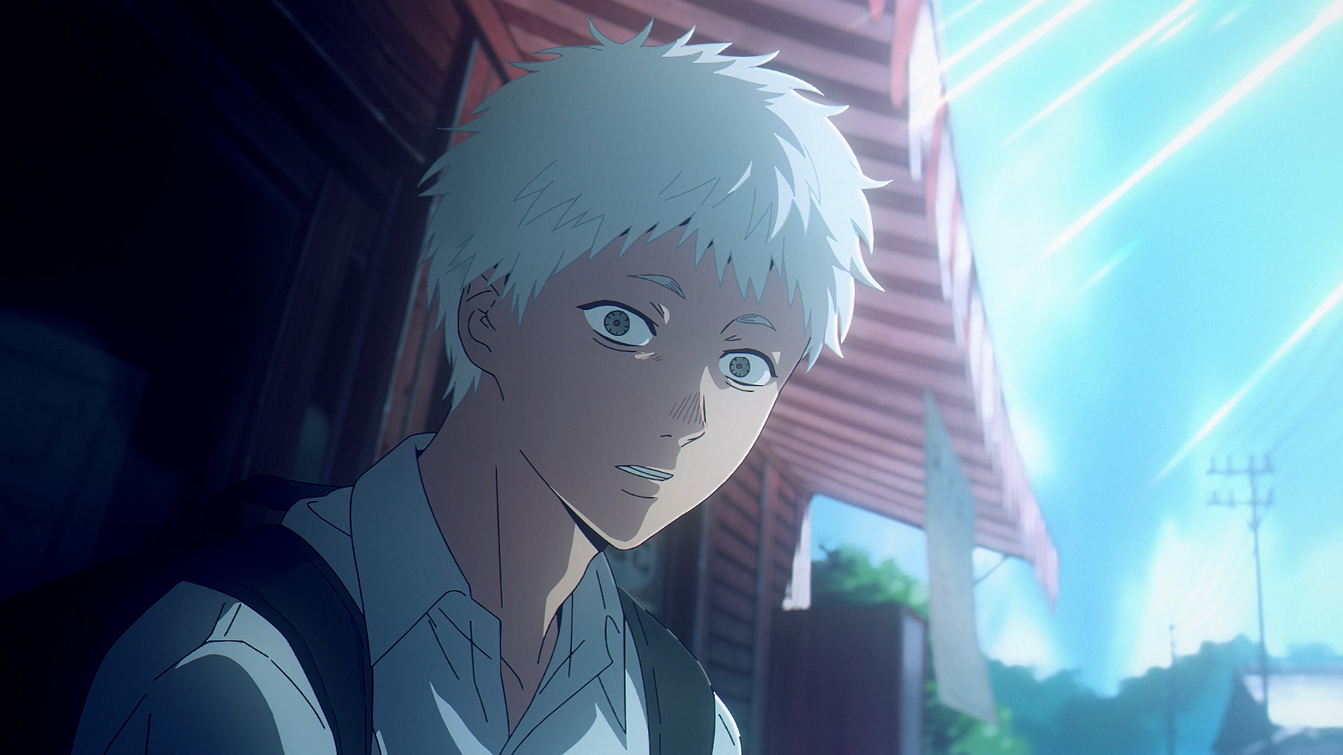 Animated still of a teenage boy with scruffy, platinum-blond hair wearing a white collared shirt and backpack looks ahead with eyes wide, stunned. Behind him is a pink awning with sunshine beaming down. The sky is clear in the distance