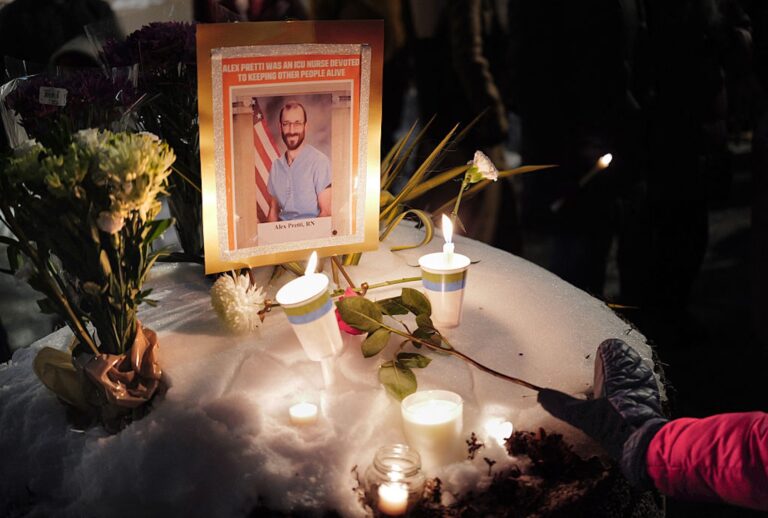 A makeshift memorial for Alex Pretti outside of the Department of Veteran Affairs in Washington, D.C. (Mandel NGAN / AFP via Getty Images)
