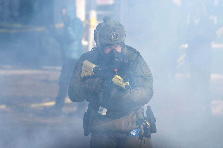 ICE agents in Minnesota continue their tactics of immigration raid that locals describe as unnecessarily violent and militaristic. This has led to 3 civilian shootings by ICE agents in just January 2026. (Stephen Maturen / Getty Images)