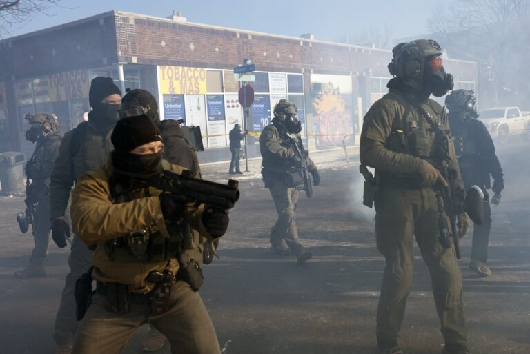 ICE officers clash with protesters after federal agents fatally shot a man this morning in south Minneapolis, setting off confrontations between protesters and agents on the Eat Street section of Nicollet Avenue  in Minneapolis, Minn., on Saturday, Jan. 24, 2026. (Photo by Richard Tsong-Taatarii/Getty Images)