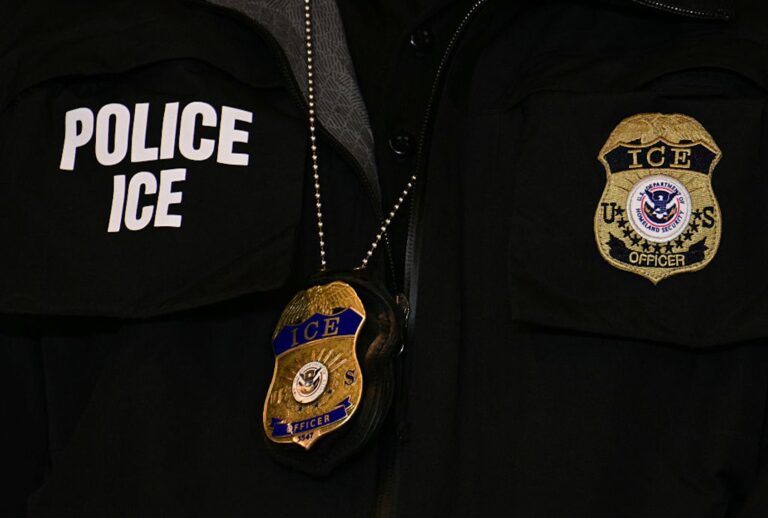 An ICE patch and badge are seen on a DHS agent during Vice President JD Vance's visit to Minneapolis on Jan. 22, 2026. (Jim Watson - Pool/Getty Images)