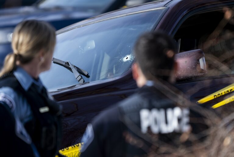 MINNEAPOLIS, MINNESOTA - JANUARY 07: A bullet hole is seen in the windshield of a vehicle involved in a shooting by an ICE agent during federal law enforcement operations on January 07, 2026 in Minneapolis, Minnesota. According to federal officials, the agent, "fearing for his life" killed a woman during a confrontation in south Minneapolis. ((Photo by Stephen Maturen/Getty Images))