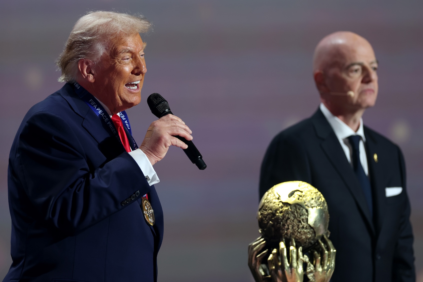 Donald Trump speaks as he receives the FIFA Peace Prize from FIFA president Gianni Infantino in Washington, Dec. 5, 2025. (Dan Mullan/Getty Images)