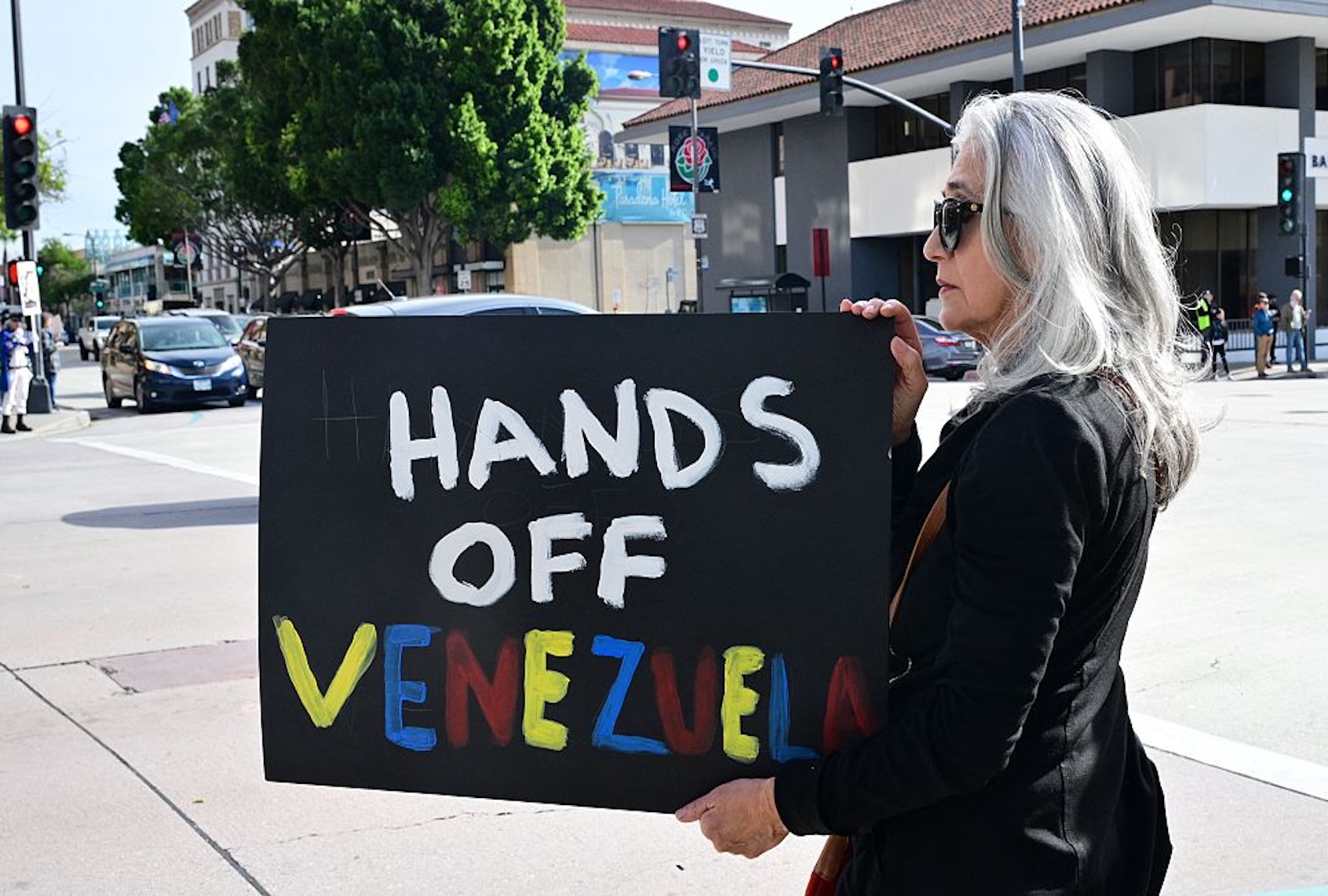 Activists protest President Donald Trump's military action in Venezuela on Jan. 6, 2026 in Pasadena, California. (Frederic J. BROWN / AFP via Getty Images)