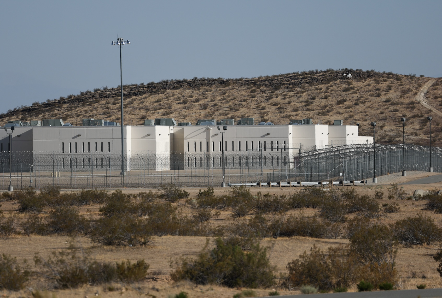 The CoreCivic, Inc. California City Immigration Processing Center in California City, California on July 10, 2025. (Photo by Patrick T. Fallon / AFP via Getty Images)