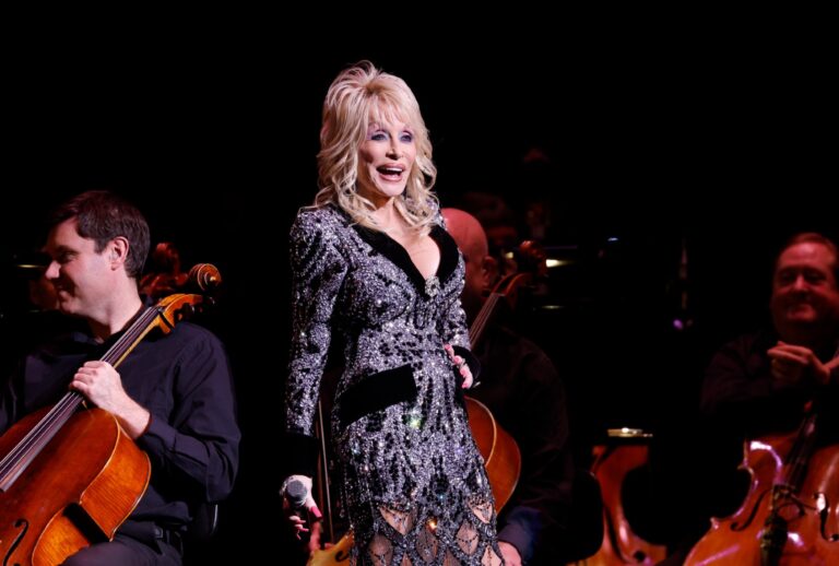 Dolly Parton speaks onstage at Dolly Parton's Threads: My Songs In Symphony World Premiere on March 20, 2025 in Nashville, Tennessee. (Jason Kempin/Getty Images)