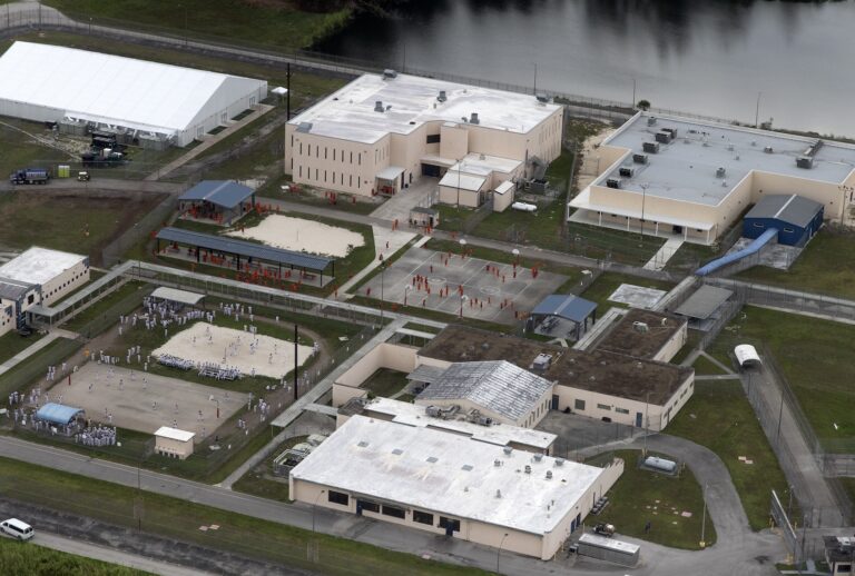 MIAMI, FLORIDA - JULY 4: In an aerial view from a helicopter, detainees are seen at Krome Detention Center run by United States Immigration and Customs Enforcement on July 4, 2025 in Miami, Florida. (Photo by Alon Skuy/Getty Images)