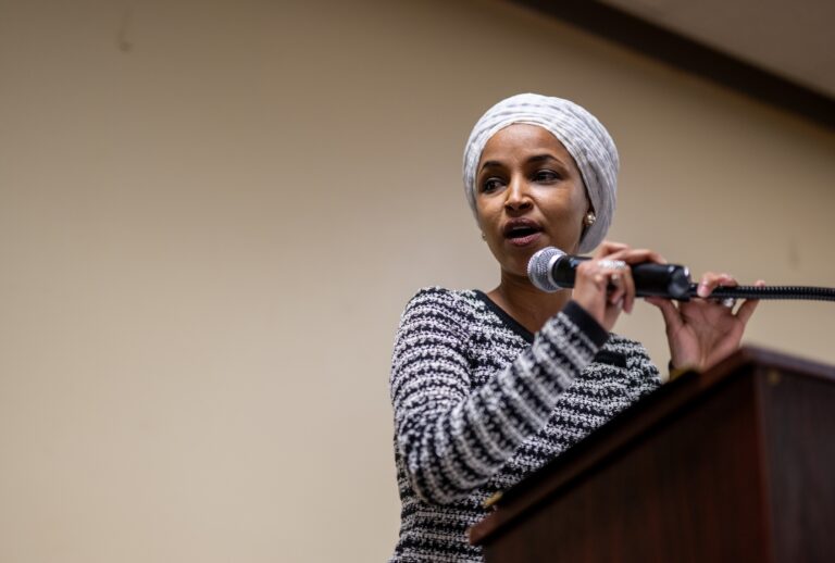 Rep. Ilhan Omar speaks during a town hall meeting at the Urban League Twin Cities facility on January 27, 2026 in Minneapolis, Minnesota. A person holding a syringe charged the podium as Omar spoke. (Photo by Brandon Bell/Getty Images)