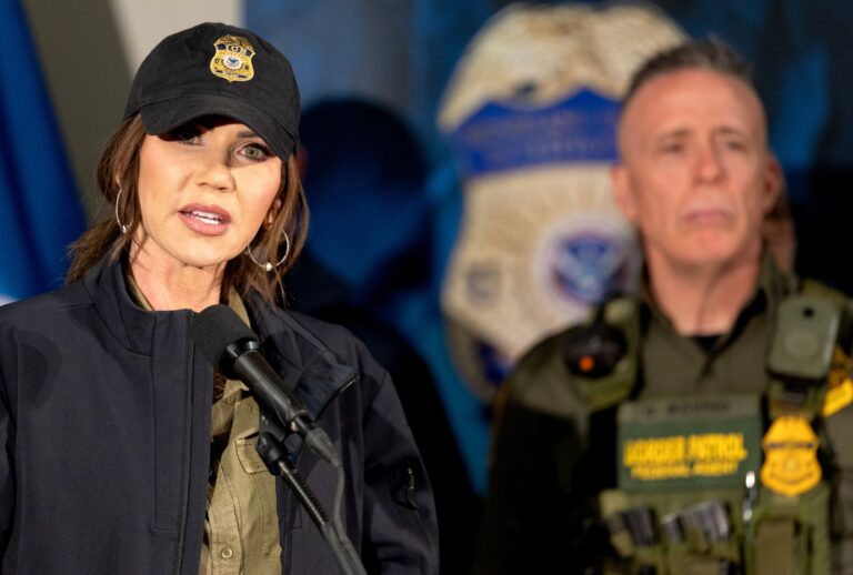 Secretary of Homeland Security Kristi Noem during a press conference at the Bishop Henry Whipple Federal Building in Minneapolis, Minn., on Wednesday, January 7, 2026. Behind Noem is Border Patrol official, Gregory Bovino. (Carlos Gonzalez/The Minnesota Star Tribune via Getty Images)