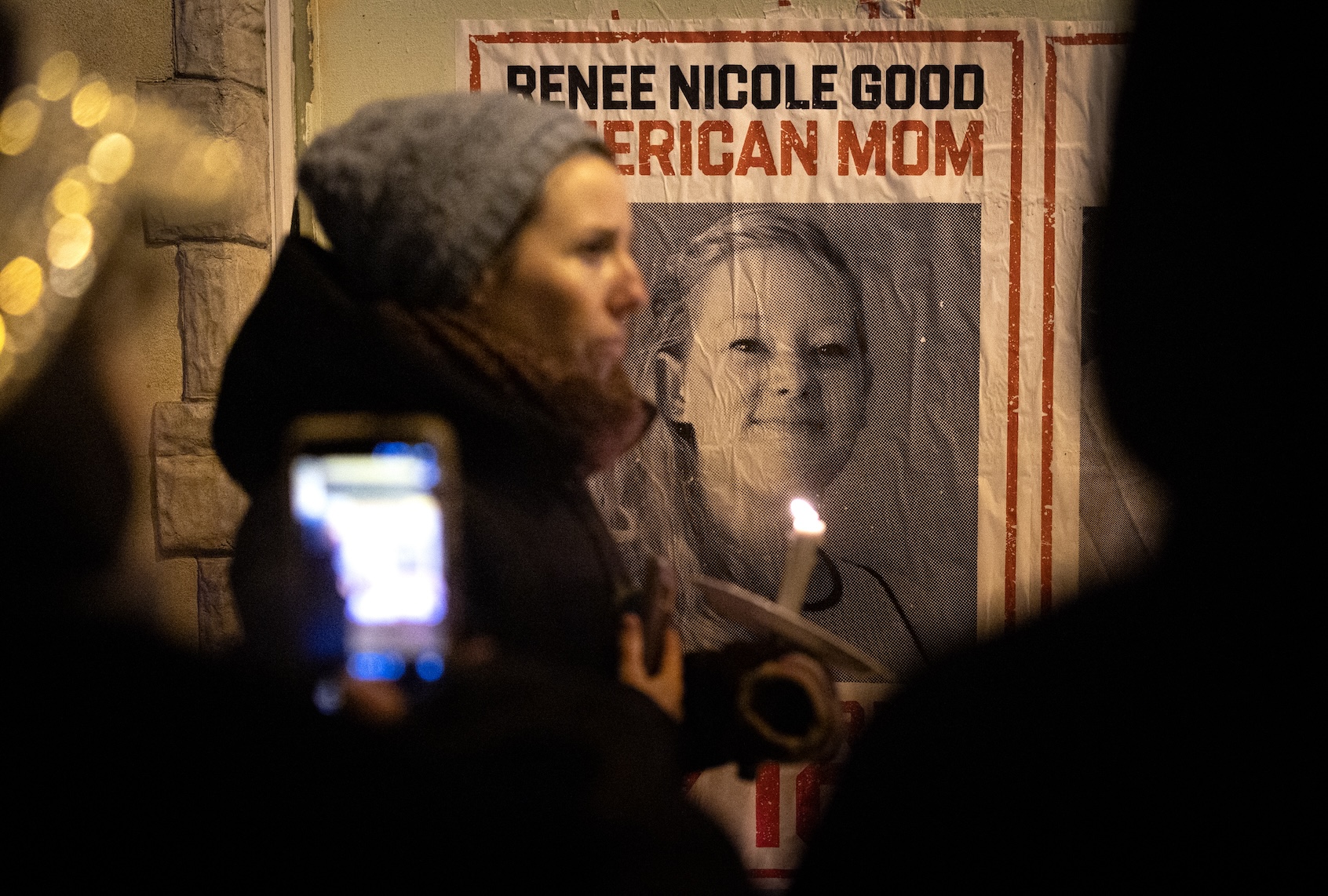 People attend a candlelight vigil organized by healthcare workers at the site where  Alex Pretti was killed on January 24, 2026 in Minneapolis, Minnesota. The vigil was held to remember the lives of Pretti and Renee Good a 37-year-old mother of three children who was killed by ICE agents on January 7. (Photo by Scott Olson/Getty Images)