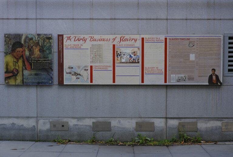 Signage about slavery is displayed on an outdoor exhibit at Independence National Historical Park in Philadelphia, Pennsylvania, on October 24, 2025. (Photo by Michael Yanow/NurPhoto via Getty Images)