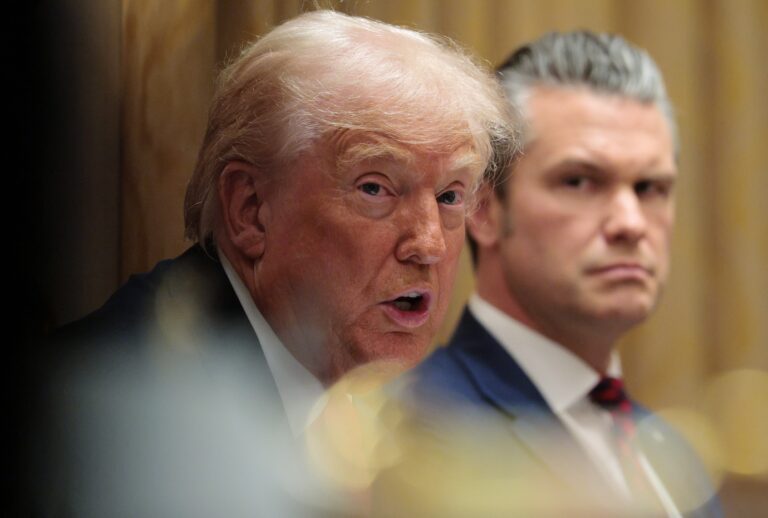 WASHINGTON, DC - DECEMBER 02: U.S. Secretary of War Pete Hegseth (R) looks on as U.S. President Donald Trump speaks during a meeting of his Cabinet in the Cabinet Room of the White House on December 02, 2025 in Washington, DC. A bipartisan Congressional investigation has begun regarding Secretary of War Pete Hegseth's role in ordering U.S. military strikes on small boats in the waters off Venezuela that have killed scores of people, which Hegseth said are intended "to stop lethal drugs, destroy narco-boats and kill the narco-terrorists who are poisoning the American people.” (Photo by Chip Somodevilla/Getty Images)