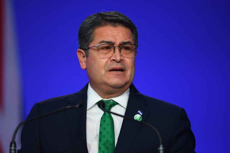 Former Honduran President Juan Orlando Hernández speaks at  COP26 at SECC on November 1, 2021. (Photo by Andy Buchanan/Getty Images)