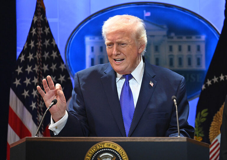 President Trump hit back after the SCOTUS decision to restrict his tariffs by finding a way to increase them even more. (China News Service / Getty Images)
