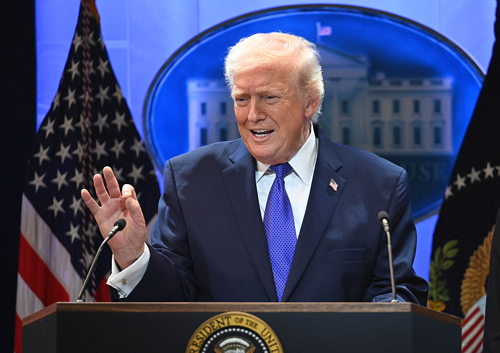 President Trump hit back after the SCOTUS decision to restrict his tariffs by finding a way to increase them even more. (China News Service / Getty Images)