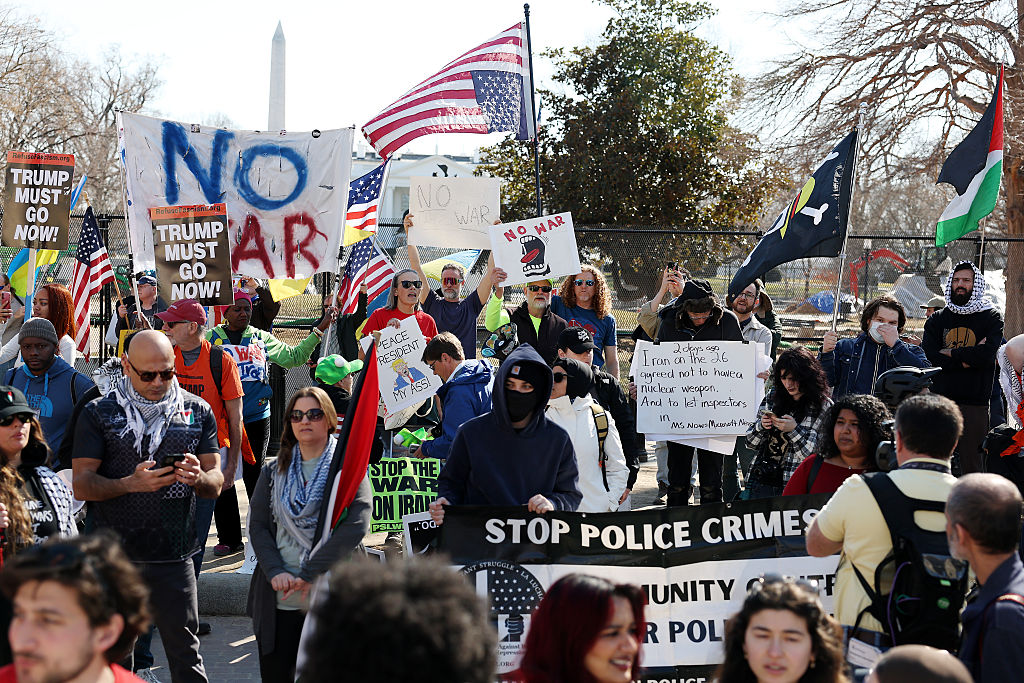 Americans react to the US-Israeli strikes on Iran as many Congressional members argue for a war powers vote to keep the White House in check. (Tasos Katopodis / Getty Images)