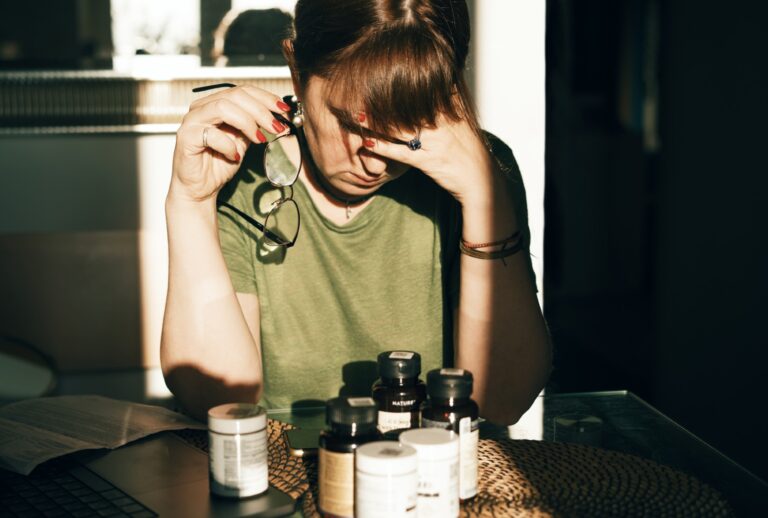 Gen X woman stressing out over hormone replacement therapy (Fiordaliso/Getty Images)