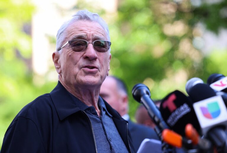 Robert De Niro speaks outside of Manhattan Criminal Court during Donald Trump's criminal trial in May 2024 (CHARLY TRIBALLEAU/AFP via Getty Images)