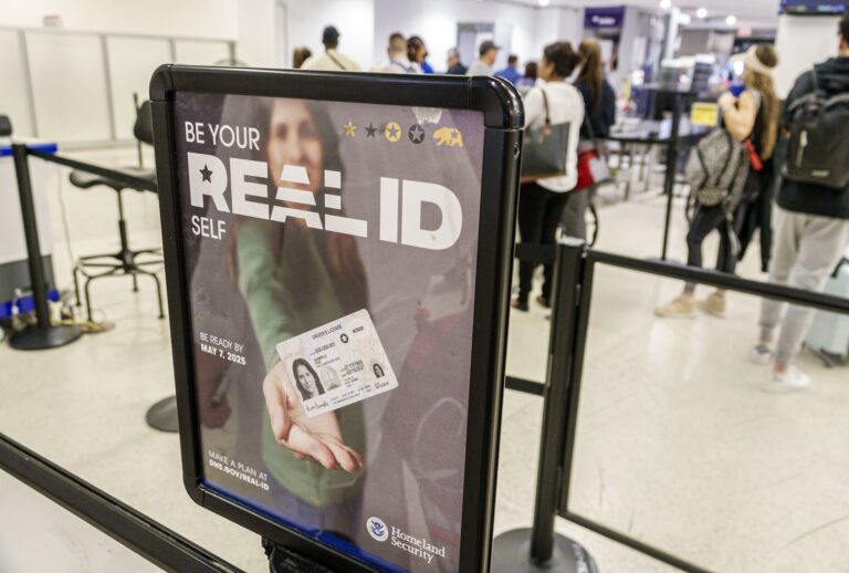 REAL ID sign at a Miami airport. (Jeff Greenberg / Getty Images)
