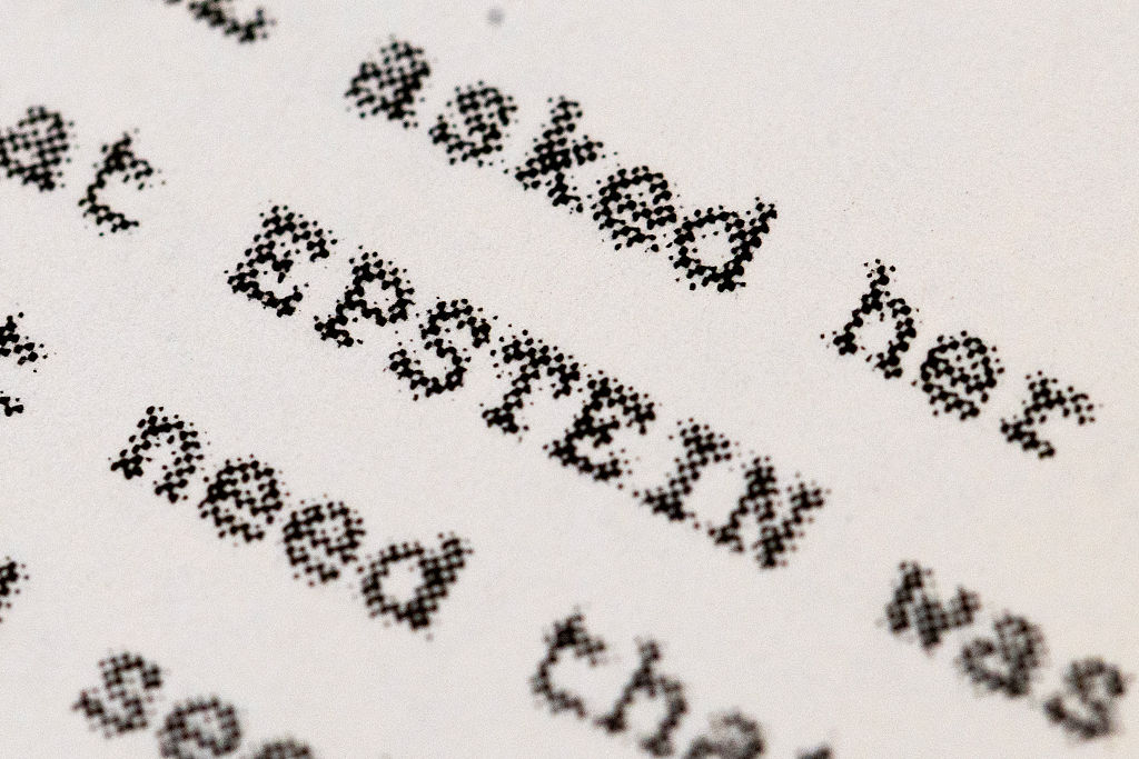 As the Epstein Files continue to be released and redacted, new discoveries of missing files, photos and suspects also continue to unravel. (Scott Olson / Getty Images)