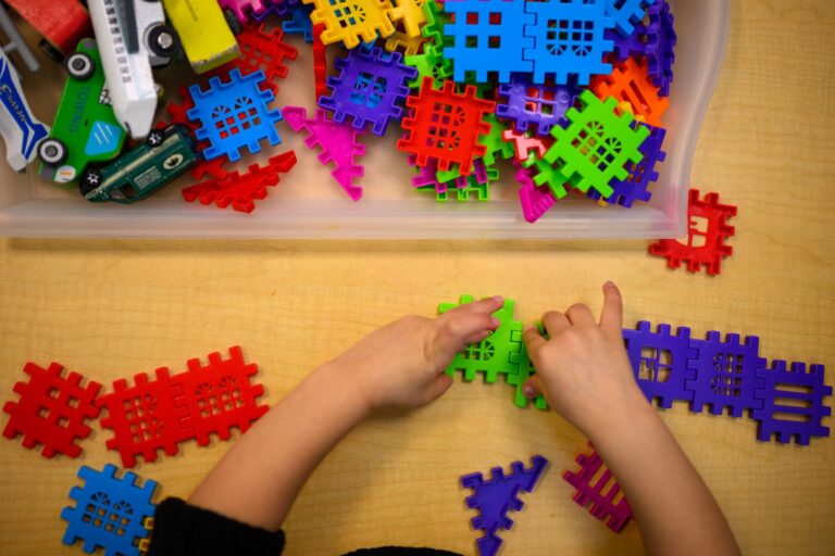 A student plays with interlocking toys at the Connecticut State University Early Learning Center on March 12, 2025. (Photo by Mark Mirko/Getty Images)