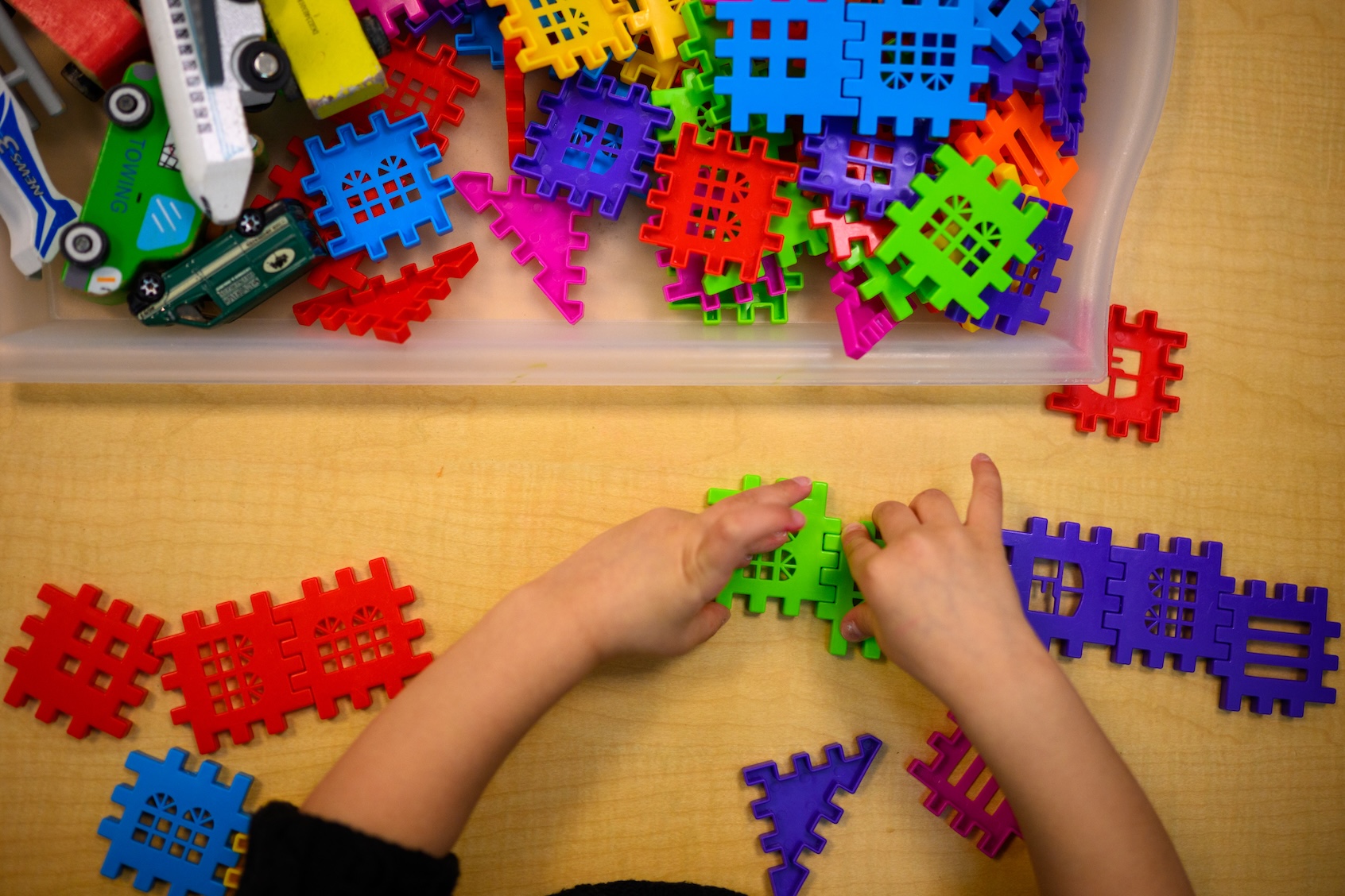A student plays with interlocking toys at the Connecticut State University Early Learning Center on March 12, 2025. (Photo by Mark Mirko/Getty Images)