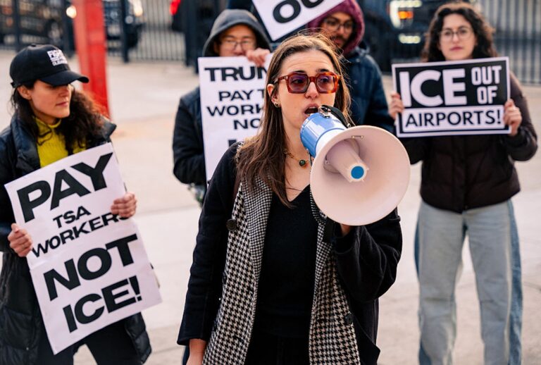 Activists protest the presence of ICE officers at John F. Kennedy International Airport and other airports throughout the country (Angelina Katsanis / AFP via Getty Images)