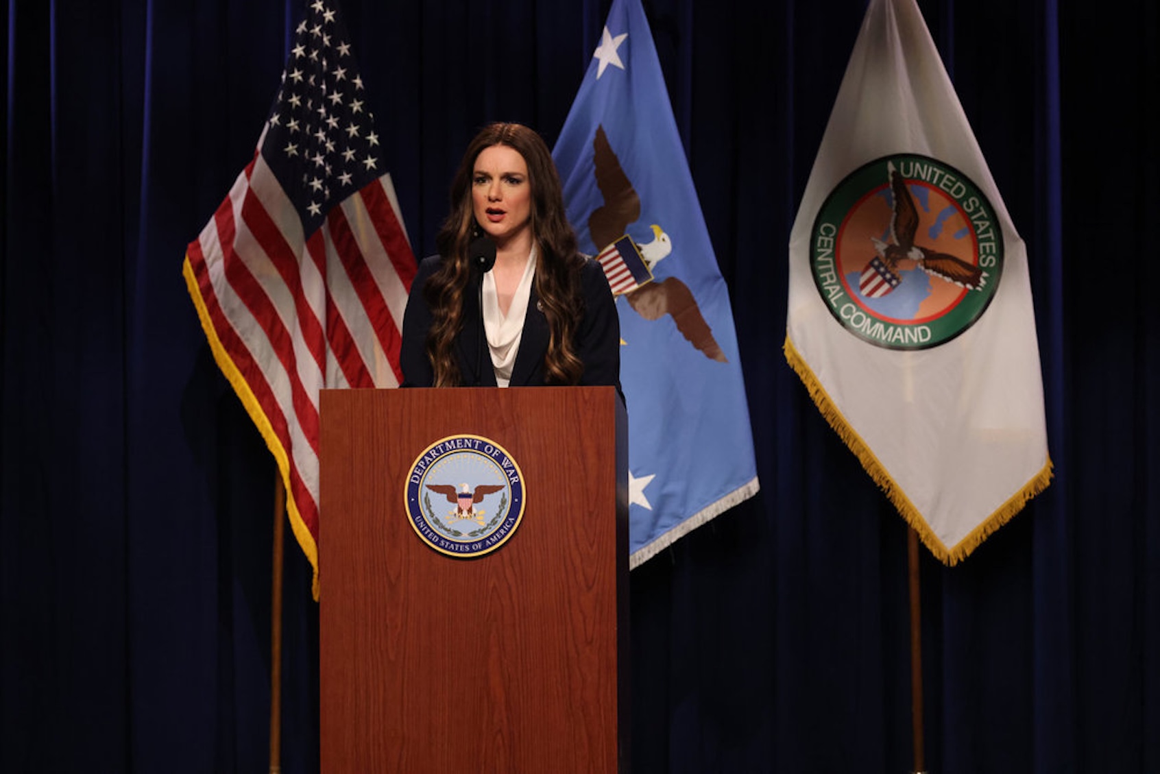 Ashley Padilla as Kristi Noem during the “Hegseth Iran Presser” Cold Open on Saturday, March 7, 2026 (Photo by Will Heath/NBC)