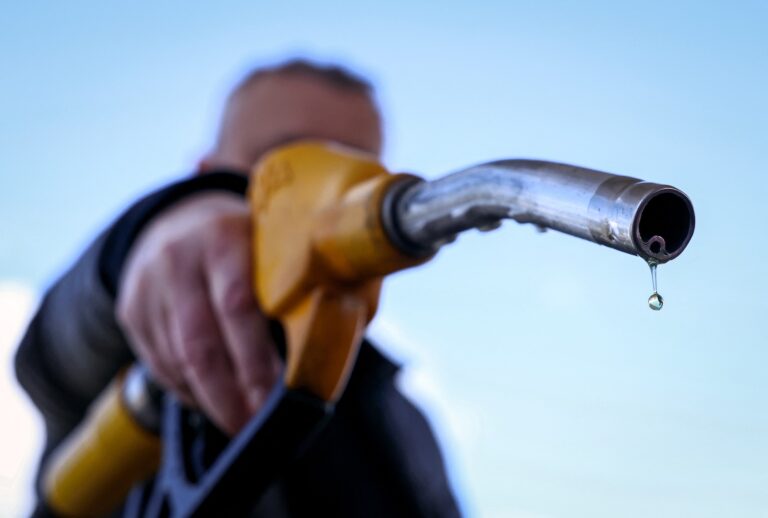 A drop of petrol falls from the nozzle of a petrol pump at a petrol station in Vélizy-Villacoublay, near Paris, on March 9, 2026. (Photo by Alain JOCARD / AFP)