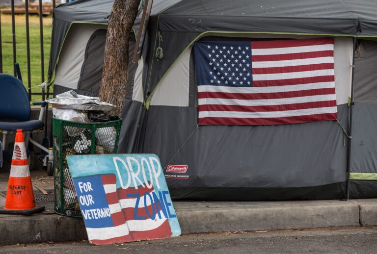 Homeless veterans are housed in 30 tents on a sidewalk along a busy San Vicente Boulevard outside the Veteran's Administration campus in West Los Angeles as viewed on April 22, 2021 in Los Angeles, California. (Photo by George Rose/Getty Images)
